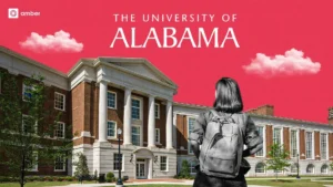 Student holding a certificate for a merit-based scholarship.
